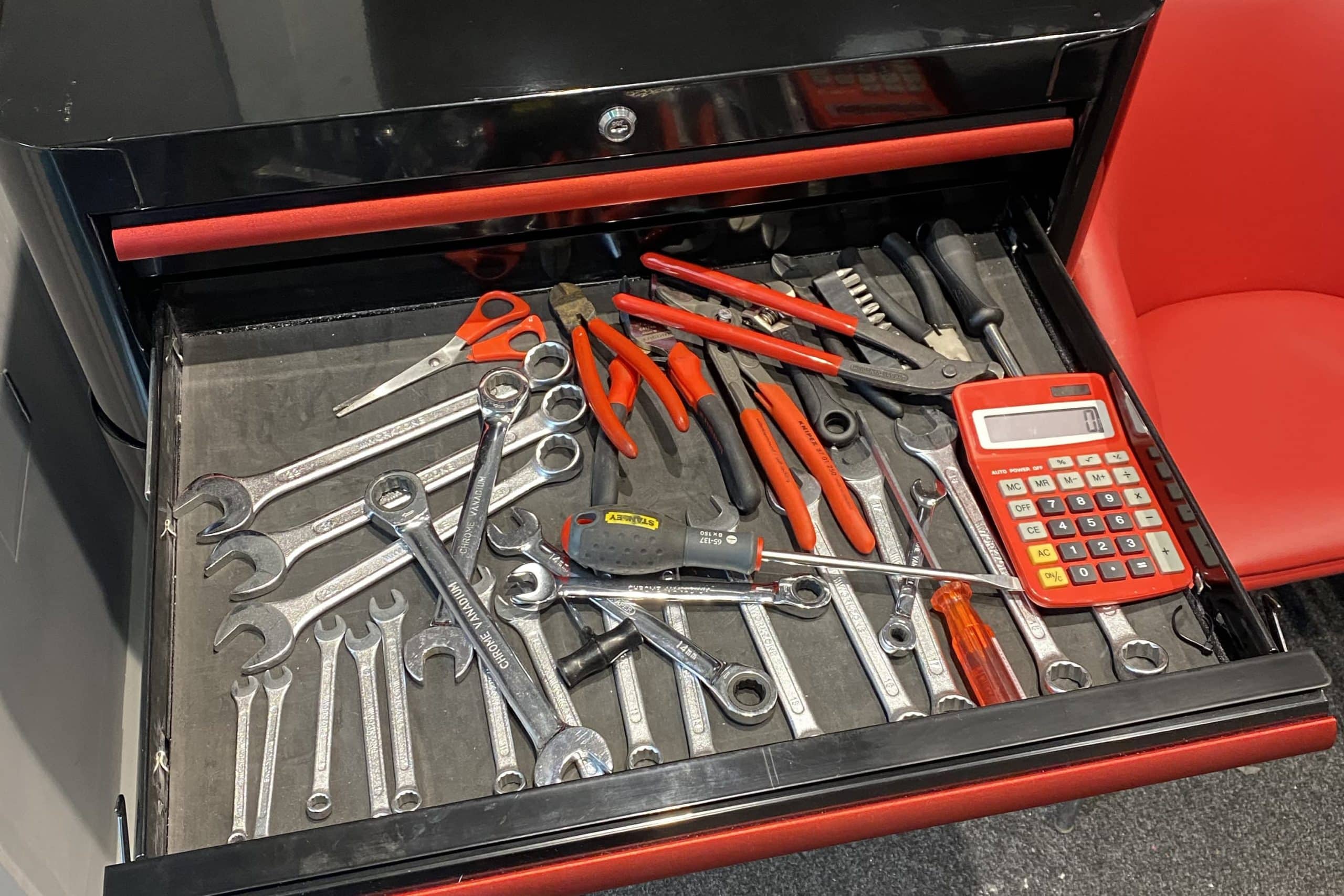 The picture shows a sealey retro tool box with many tools inside, however the tools are all over the place, no placement, no organisation and you could easily lose a tool with this style of organisation